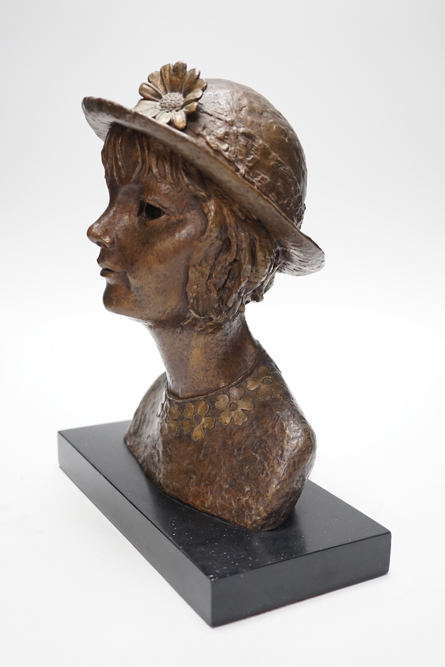 A bronze portrait bust, believed to be film director's wife, Mo Endfield, 27cms high